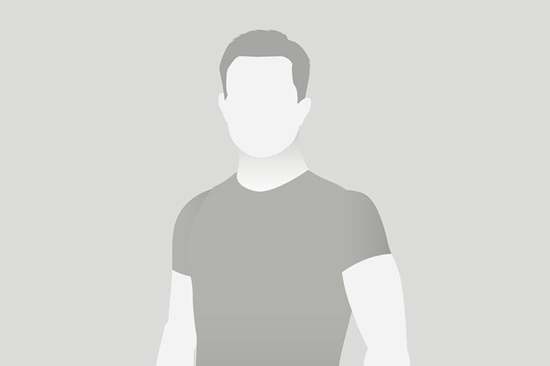 Bild einer anonymen Figur ohne erkennbare Gesichtszüge, in einem grauen Hintergrund und neutralen Farben.